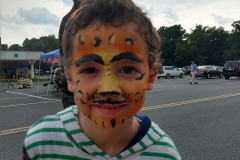 Happy face painting customer